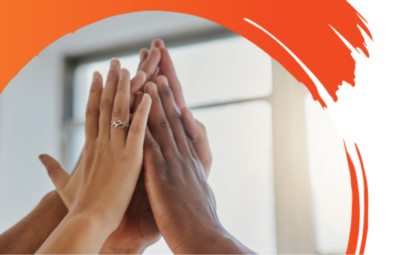 Several hands coming together in a high-five gesture, with an orange curved design framing the image.